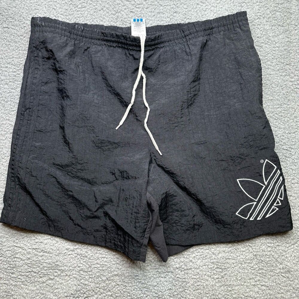 Vintage Adidas swim trunks lined. Size large
